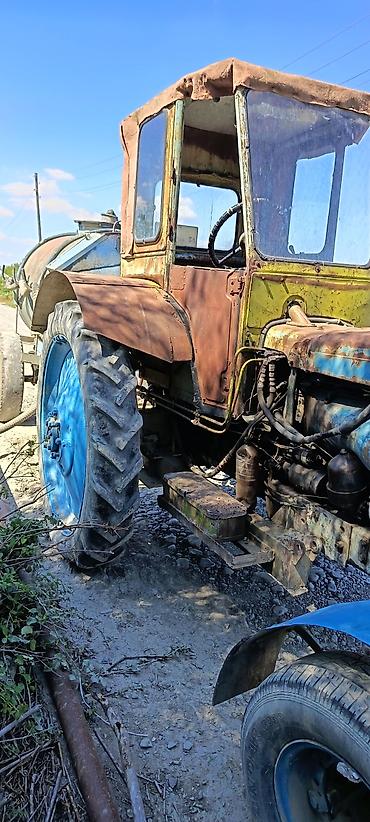 qis təkəri: Kənd təsərrüfatı işləri üçün nəzərdə tutulmuş kabinalı traktor — 1