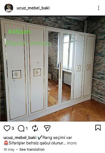 Ev üçün mebel: Ağ rəngli, klassik üslubda 5 qapılı geyim dolabı. Orta hissədə 2 ədəd — 1