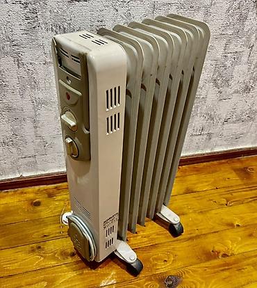 Yağlı radiator (elektrikli) - 7 bölməli, mərtəbə tipli yağ radiatoru lalafo.az -da Yağlı radiator (elektrikli) - 7 bölməli, mərtəbə tipli yağ radiatoru