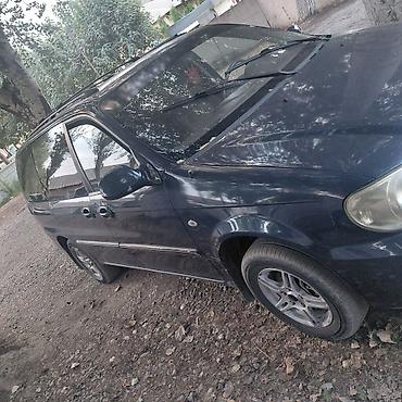 mazda 626 2002: Kia Carnival: 2005 г., 2.4 л, Автомат, Бензин, Минивэн — 2
