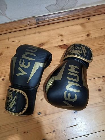 mma əlcəyi: Venum döyüş avadanlıqları dəsti Məzmun: - 1 cüt Venum shin guard – — 2
