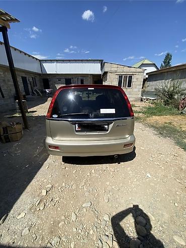вязанную накидку: Honda Stream: 2003 г., 1.7 л, Автомат, Бензин, Универсал — 5