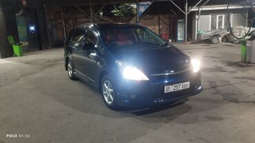 продаю саната: Автомобиль Toyota Wish синего цвета, минивэн. Подходит для семейных