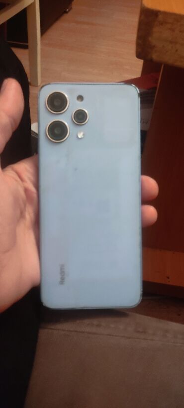 телефон флай сириус 11 фс517: Xiaomi 12, 256 ГБ, цвет - Голубой, 
 Сенсорный, Отпечаток пальца, Две SIM карты