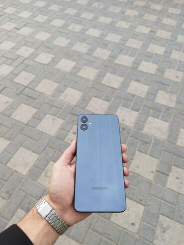 телефон флай с двумя симками сенсорный: Samsung Galaxy A05, 128 ГБ, цвет - Синий, Гарантия, Сенсорный, Две SIM карты