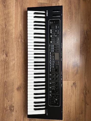 Sintezatorlar: Yamaha CK61 səhnə klaviaturası - 61 ədəd tam ölçülü klaviş (sürüşmə — 1