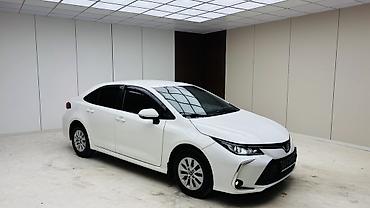 трактор 82 1: Toyota Corolla: 2019 г., 1.8 л, Автомат, Гибрид, Седан — 2