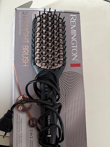 isdilik sisdemi: Remington S düzləşdirici daraq – 2‑si 1‑də - Saçları daranaraq eyni — 1