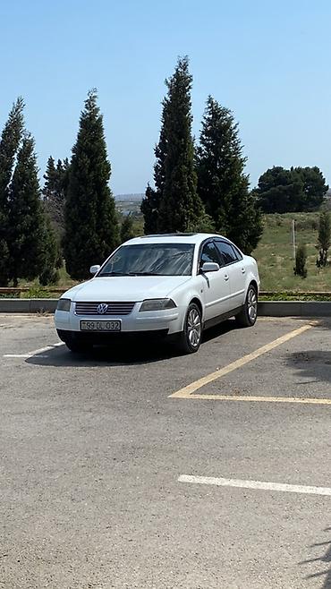 ford focus hatchback: Volkswagen Passat: 2 l | 2001 il Sedan — 2