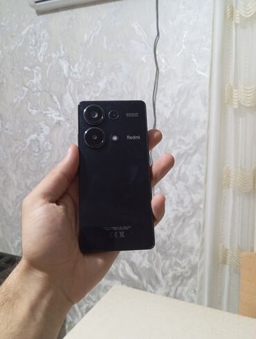 Redmi: Redmi smartfon - Rəng: qara, parlaq arxa panel - Kamera: arxada çoxlu — 7