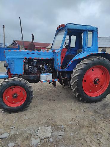 Traktor qoşqularının ehtiyyat hissələri: Rəngi göydür. Kabinası mövcuddur. Ön hissəsindəki radiator barmaqlığı — 9