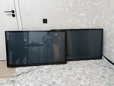 домашние проекторы: Телевизоры LG, диагональ примерно 40–43". Классический черный корпус — 2