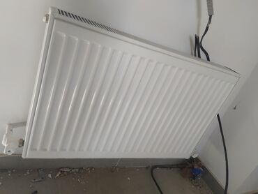 Тепловые завесы: Стальные панельные радиаторы “DEMRAD” изготовливаются на заводе “Demir — 6