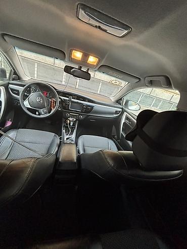 scooter elektrikli: Toyota Corolla sedan – ağ rəng, 4 qapı, 5 yerlik. 1.6 mator sade — 3