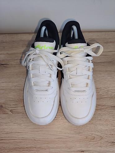 cc sandale: Adidas kožne patike – bele sa crnim prugama i neonsko‑zelenim — 1