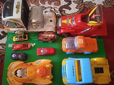 Другие игровые комплексы: Детские игрушеки транспорт и герои Состав: - Разнообразные машинки — 1