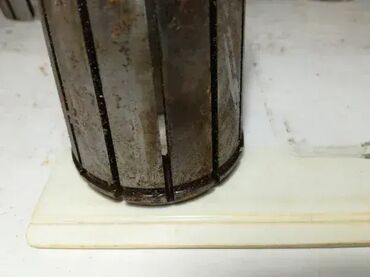 Ostali uređaji: Stezne caure JAL duzine 68mm, precnik na najsirem delu je 52mm — 10
