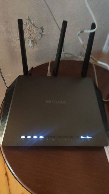 sazz internet ayliq odenis: Netgear Nighthawk R7000 AC1900 Wi-Fi routeri, yüksək sürətli internet