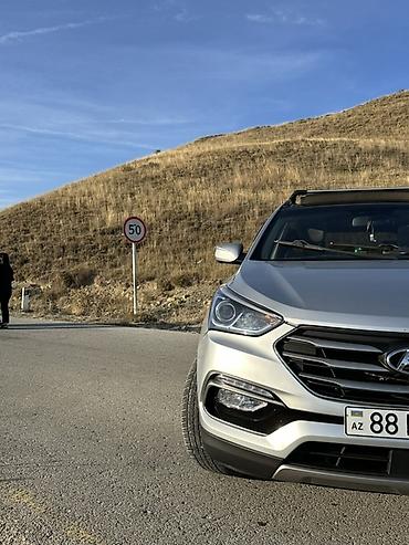 Hyundai: Hyundai Santa Fe: 2 л | 2016 г. Внедорожник — 4