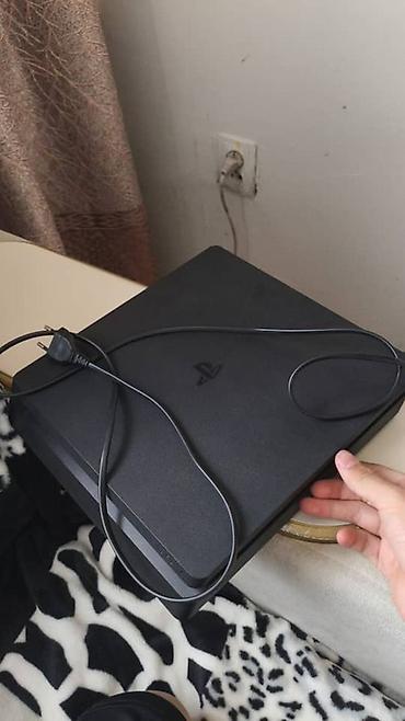 PS4 (Sony PlayStation 4): Игровая консоль Sony PlayStation 4 Slim (чёрная) Комплектация: - — 2