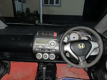 трамблер срв: Honda Fit: 2003 г., 1.3 л, Автомат, Бензин, Хэтчбэк — 7