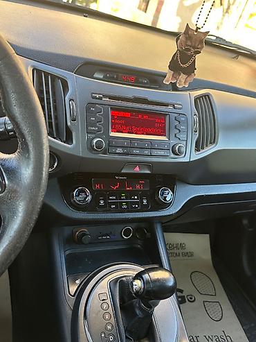 Kia: Kia Sportage: 2 l | 2011 il Universal — 7