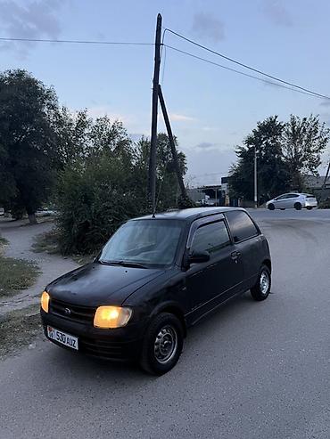 муравей с бензином: Daihatsu Cuore: 2001 г., 1 л, Механика, Бензин, Купе — 1