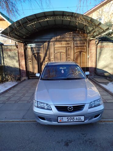 авто навигатор: Mazda 626: 2000 г., 2 л, Механика, Бензин, Хэтчбэк