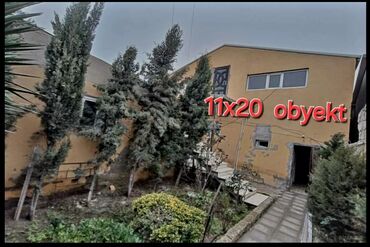 Binalar: Binə qəsəbəsində yerləşən “Vasaq” İdman Klubu və yanında ayrıca — 3