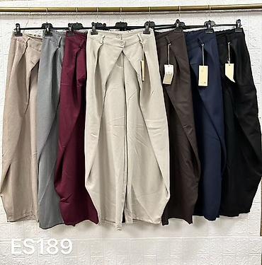 torba puta: Ženske široke pantalone sa preklopom i visokim strukom
2500din
S M L — 8