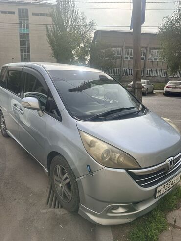 рулевая колонка опель: Минивэн Honda Stepwgn серебристого цвета. Отличается просторным