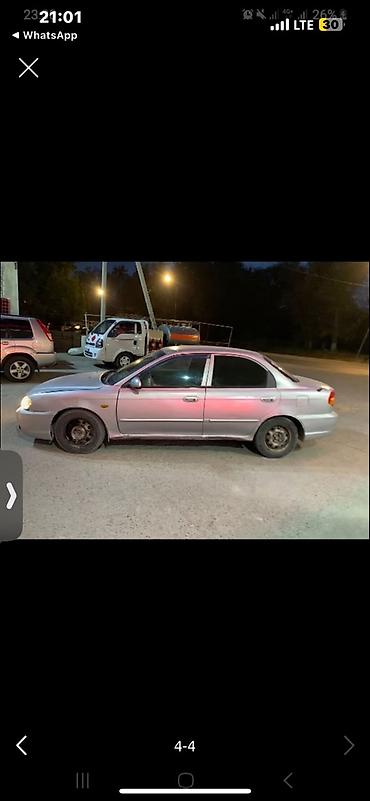 mazda 626 1989: Kia Spectra: 2003 г., 1.5 л, Автомат, Бензин, Седан — 4