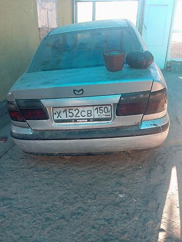 Mazda 626: 1999 г., Бензин, Седан