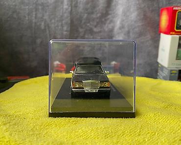 Avtomobil modelləri: Коллекционная модель Mercedes-Benz 200 W123 Hearse black 1982 Schuco — 8