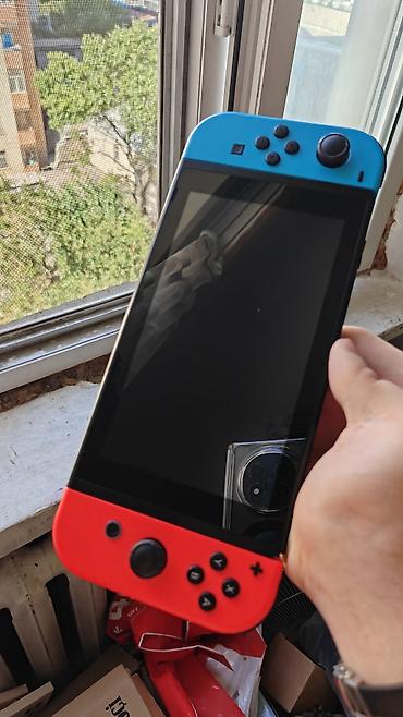 Nintendo Switch (Neon Blue/Neon Red) oyun konsolu bez prablem tezeden