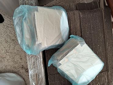 taxta qutular: 3 ölçü pizza paketleri heresinden 100 dene. 300 dene ümumi. 2 ölçü — 7