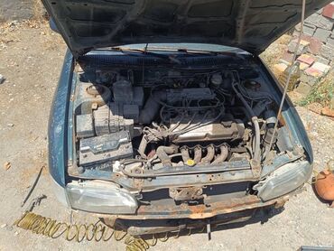 Другие детали кузова: Универсал Mitsubishi Lancer, модель пятого поколения, в темно-зеленом — 7