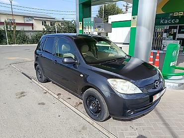 masda demio: Mazda Demio: 2005 г., 1.3 л, Автомат, Газ, Хэтчбэк — 10