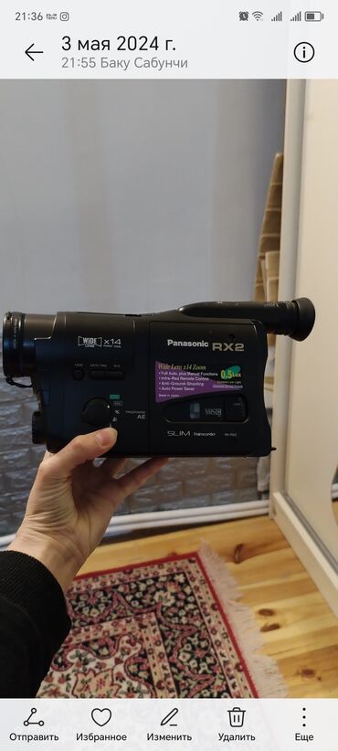 kiçik kamera: Kicik Panasonik video kamera az işlənib sumkası hər şeui ustunde