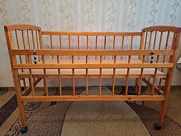 кормящих стол: Детская кроватка из массива (сосна) с регулируемым основанием — 2