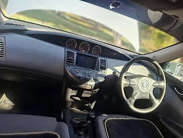 e63 212: Nissan Primera: 2002 г., 1.8 л, Механика, Бензин, Лифтбек — 5