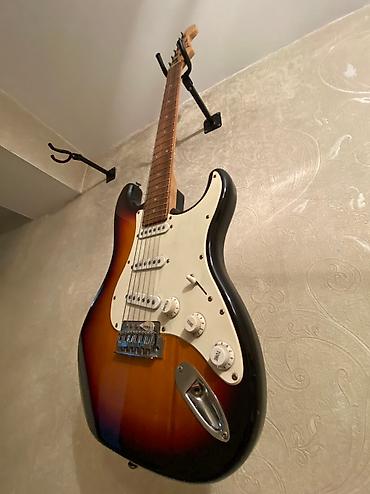 Gitaralar: Elektron gitara, 6 sim, İşlənmiş, Ünvandan götürmə — 3