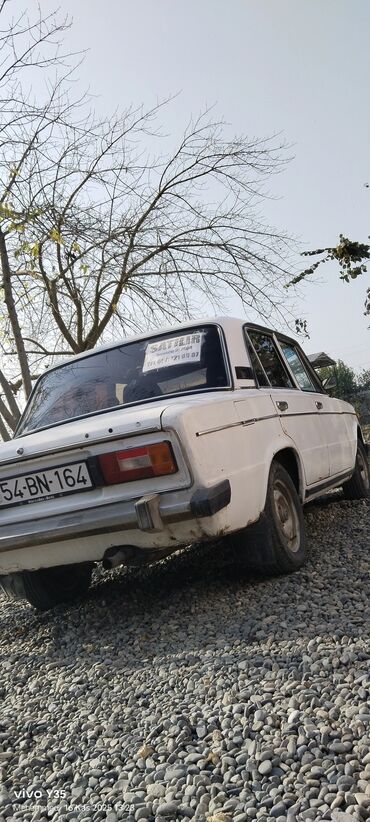 VAZ (LADA): VAZ 2106 (klassik “Jiguli”) – ağ rəngli sedan Xarici: - Dördgöz ön — 10