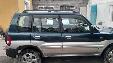 колонки жбл: Mitsubishi Pajero iO: 2001 г., Бензин, Внедорожник — 2