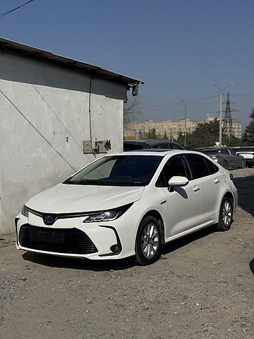 Toyota: Toyota Corolla: 2022 г., 1.8 л, Вариатор, Гибрид, Седан — 1