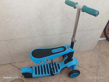 2107 teker: Uşaq skuter/çəkicək – 3 təkərli, mavi rəng Xüsusiyyətlər: - Ön — 1