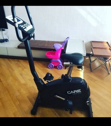Uzunmüddətli kirayə mənzillər: Qara rəngli, “Care” markalı, ayaq pedalları və elektron ekranı olan