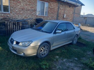 купить двигатель на нексию в бишкеке: Subaru Impreza — это компактный седан серебристого цвета. Модель