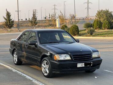 Mercedes-Benz: Mercedes-Benz C-Class: 1.8 l | 1995 il Sedan — 12