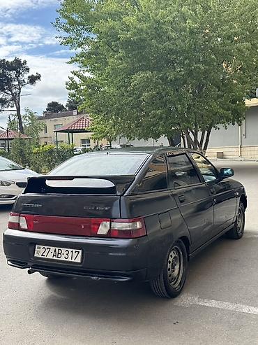 VAZ (LADA): Model: Lada 2112 (hatchback, 5 qapı) Rəng: qara (mat) Yanacaq: benzin — 6